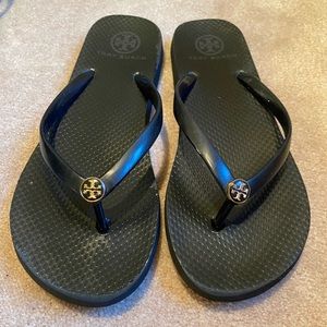 Tory Burch black rubber flip flops size 7
